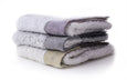Kontex Palette Towels (stack of blue and yellow towels)